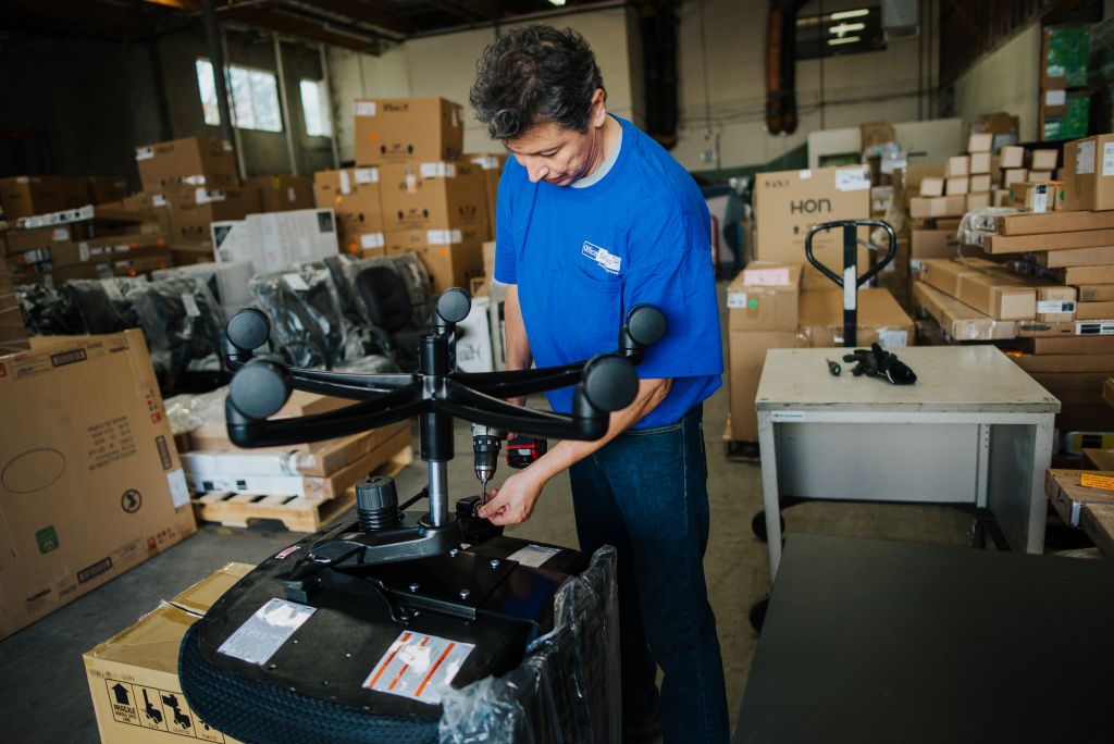 Furniture is assembled in our Orange County warehouse at Office Solutions.