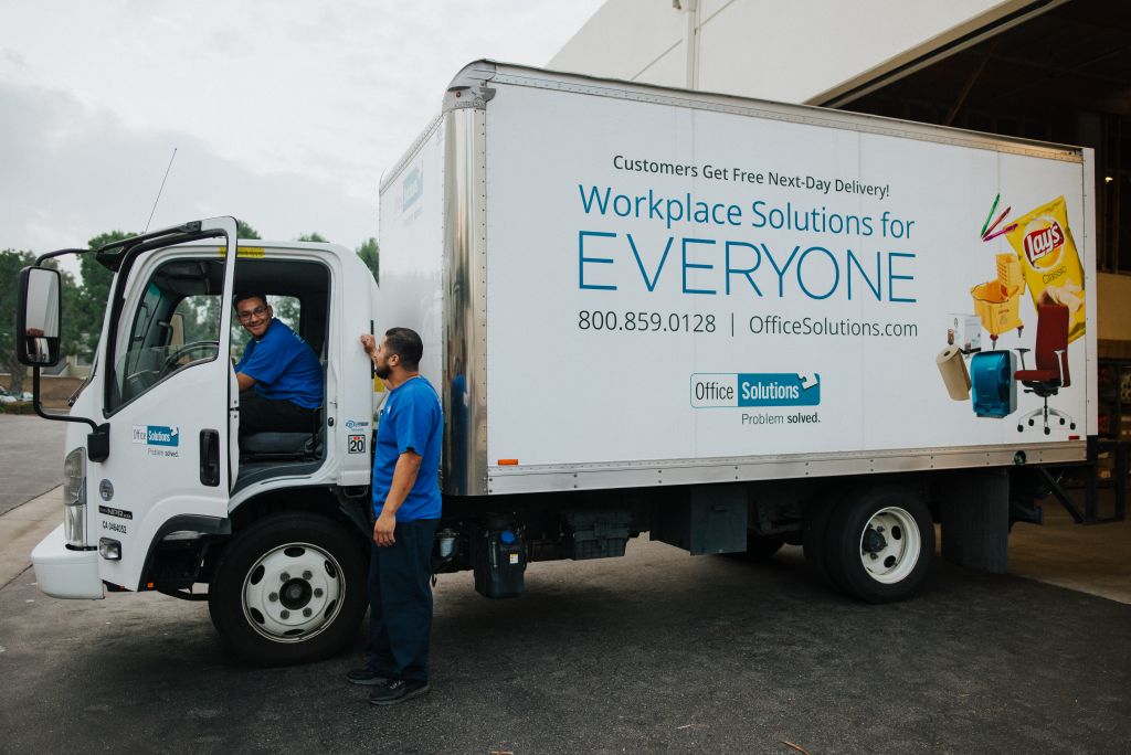 Our drivers have a short discussion before their morning deliveries.